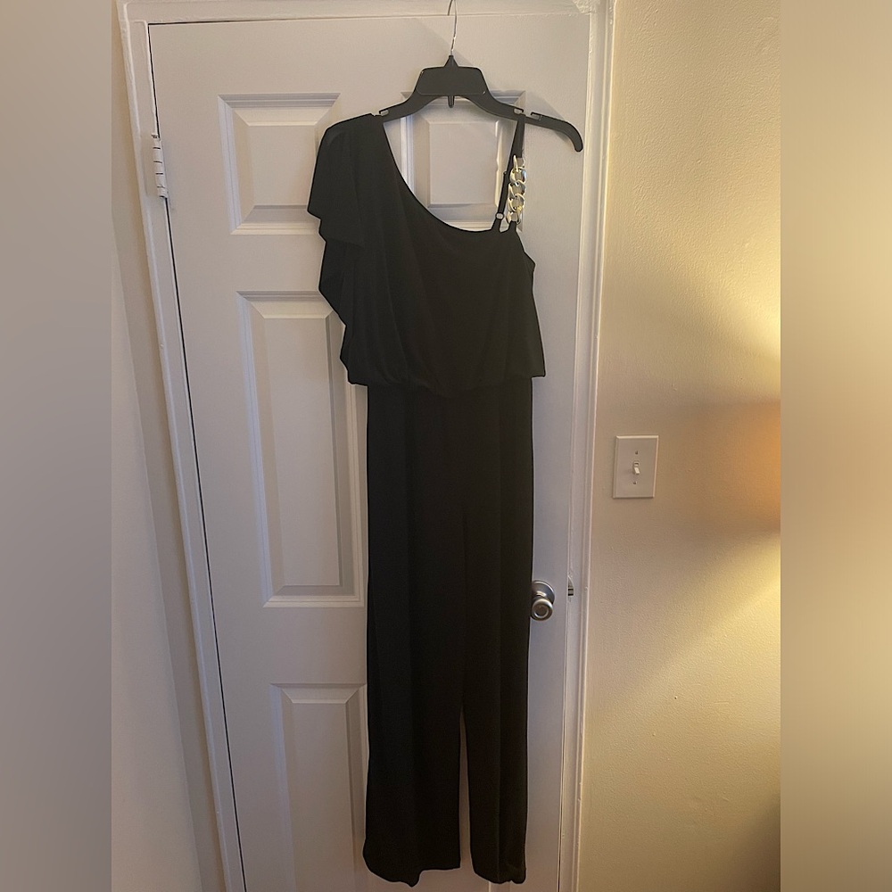 Black Asymmetrical Jumpsuit with Flowy Pants and Gold Chain Detail